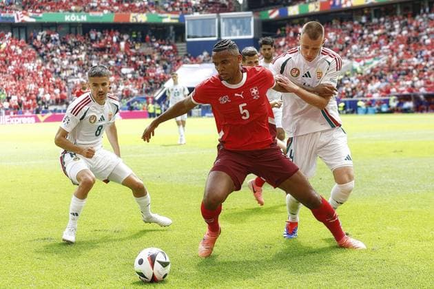 COLOGNE, RheinEnergie Stadium, 15-06-2024 , European Football Championship Euro2024, Group stage match no.2 between Hungary and Switzerland. Hungary player Attila Szalai and Switzerland player Manuel Akanji Hungary - Switzerland (Euro2024)  x25494899x Copyright: