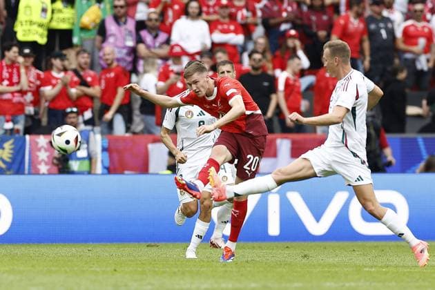 COLOGNE, RheinEnergie Stadium, 15-06-2024 , European Football Championship Euro2024, Group stage match no.2 between Hungary and Switzerland. Hungary player Adam Lang and Switzerland player Michel Aebischer Hungary - Switzerland (Euro2024)  x25494914x Copyright: