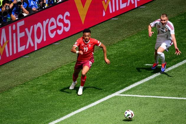COLOGNE, GERMANY - 15 JUNE, 2024: Dan Ndoye, Attila Szalai, The football match of EURO 2024 Hungary vs. Switzerland at Rhein Energie Stadion  Copyright: xVITALIIxKLIUIEVx