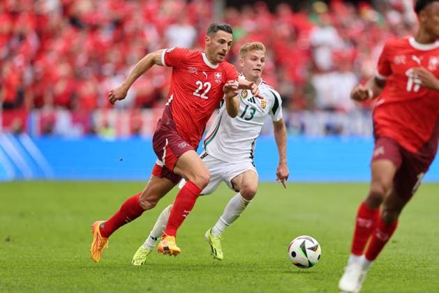 15.06.2024, Fussball Europameisterschaft, UEFA EURO, EM, Europameisterschaft,Fussball 2024, Ungarn - Schweiz, Gruppe A, Köln Stadion, v.l., Fabian Schär (Schweiz), Andras Schäfer (Ungarn) Copyright: HMBxMedia