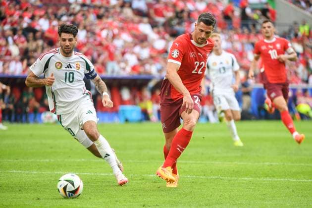 COLOGNE, GERMANY - JUNE 15: Fabian Schar of Switzerland (R) against Dominik Szoboszlai of Hungary (L) during the UEFA EURO, EM, Europameisterschaft,Fussball 2024 group stage match between Hungary and Switzerland at Cologne Stadium on June 15, 2024 in Cologne, Germany. Cologne Cologne Stadium North Rhine-Westphalia Germany Copyright: xJustPictures.ch ManuelxWinterbergerx jp-en-EuSpIm-MWI_7721