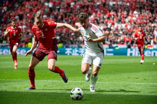 Silvan Widmer (Schweiz, 03) im Zweikampf mit Milos Kerkez (Ungarn, 11), GER, Hungary (HUN) vs Switzerland (SUI), Fussball Europameisterschaft, UEFA EURO, EM, Europameisterschaft,Fussball 2024, Gruppe A, 1. Spieltag, 15.06.2024 GER, Hungary (HUN) vs Switzerland (SUI), Fussball Europameisterschaft, UEFA EURO 2024, Gruppe A, 1. Spieltag, 15.06.2024 Koeln Copyright: xEibner-Pressefoto Memmlerx EP_MMR