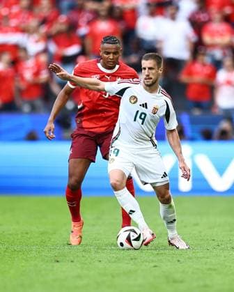Barnabas Varga of Hungary is challenged by Manuel Akanji of Switzerland Hungary v Switzerland, UEFA European Championship, EM, Europameisterschaft 2024, Group A, Football, Cologne Stadium, Cologne, Germany, 15 Jun 2024 EDITORIAL USE ONLY No use with unauthorised audio, video, data, fixture lists, club league logos or live services. Online in-match use limited to 120 images, no video emulation. No use in betting, games or single club league player publications. Copyright: xMichaelxZemanek Shutterstockx 14539265bb