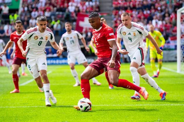 Hungary v Switzerland: Group A - UEFA EURO, EM, Europameisterschaft,Fussball 2024 Manuel Akanji of Switzerland is being challenged by Adam Nagy and Attila Szalai of Hungary, during the UEFA Euro 2024 Group A football match between Hungary and Switzerland at the Cologne Stadium in Cologne on June 15, 2024. Cologne Germany  Copyright: xHeshamxElsherifx originalFilename:elsherif-hungaryv240615_npbSS.jpg