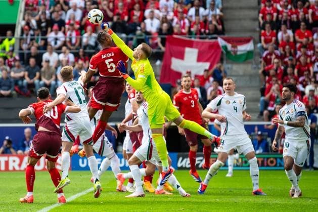 Hungary v Switzerland: Group A - UEFA EURO, EM, Europameisterschaft,Fussball 2024 Peter Gulacsi of Hungary is confronting Granit Xhaka of Switzerland, Andras Schaefer of Hungary, and Manuel Akanji of Switzerland, during the UEFA Euro 2024 Group A football match between Hungary and Switzerland at the Cologne Stadium in Cologne on June 15, 2024. Cologne Germany  Copyright: xHeshamxElsherifx originalFilename:elsherif-hungaryv240615_npIgy.jpg
