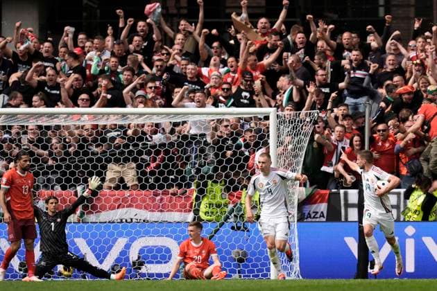 Hungary s Barnabas Varga celebrates after scoring the 1-0 goal for his team at the Euro 2024 soccer match between Hungary and Swiss at the RheinEnergiestadion, Cologne, Germany - Friday 15 , June , 2024. - Soccer .  Copyright: xFabioxFerrari LaPressex