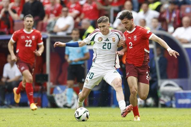 COLOGNE, RheinEnergie Stadium, 15-06-2024 , European Football Championship Euro2024, Group stage match no.2 between Hungary and Switzerland. Hungary player Roland Sallai and Switzerland player Leonidas Stergiou Hungary - Switzerland (Euro2024)  x25495261x Copyright: