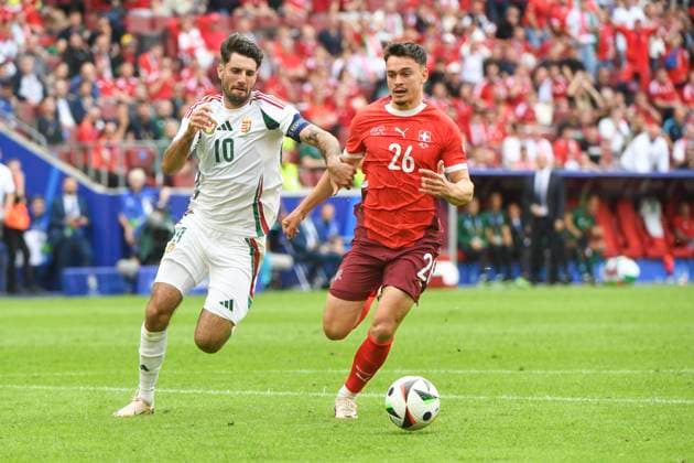 COLOGNE, GERMANY - JUNE 15: Fabian Rieder of Switzerland (R) against Dominik Szoboszlai of Hungary (L) during the UEFA EURO, EM, Europameisterschaft,Fussball 2024 group stage match between Hungary and Switzerland at Cologne Stadium on June 15, 2024 in Cologne, Germany. Cologne Cologne Stadium North Rhine-Westphalia Germany Copyright: xJustPictures.ch ManuelxWinterbergerx jp-en-EuSpIm-MWI_7896