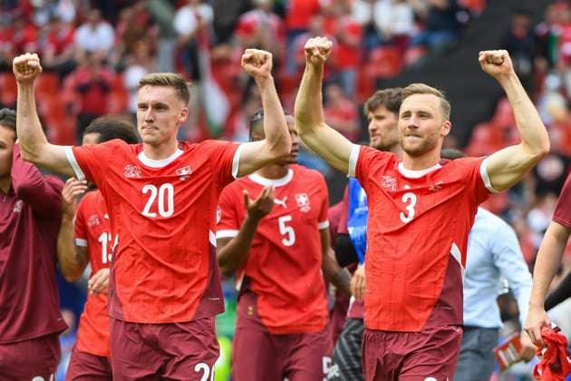 COLOGNE, GERMANY - JUNE 15: Michel Aebischer of Switzerland (L) and Silvan Widmer of Switzerland (R) celebrates victory after the UEFA EURO, EM, Europameisterschaft,Fussball 2024 group stage match between Hungary and Switzerland at Cologne Stadium on June 15, 2024 in Cologne, Germany. Cologne Cologne Stadium North Rhine-Westphalia Germany Copyright: xJustPictures.ch ManuelxWinterbergerx jp-en-EuSpIm-MWI_7938