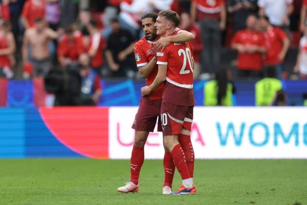 Cologne, Germany, 15th June 2024. Michel Aebischer of Switzerland celebrates with team mates after scoring to give the side a 2-0 lead during the UEFA European Championships match at Cologne Stadium, Cologne. Picture credit should read: Jonathan Moscrop Sportimage EDITORIAL USE ONLY. No use with unauthorised audio, video, data, fixture lists, club league logos or live services. Online in-match use limited to 120 images, no video emulation. No use in betting, games or single club league player publications. SPI-3181-0029