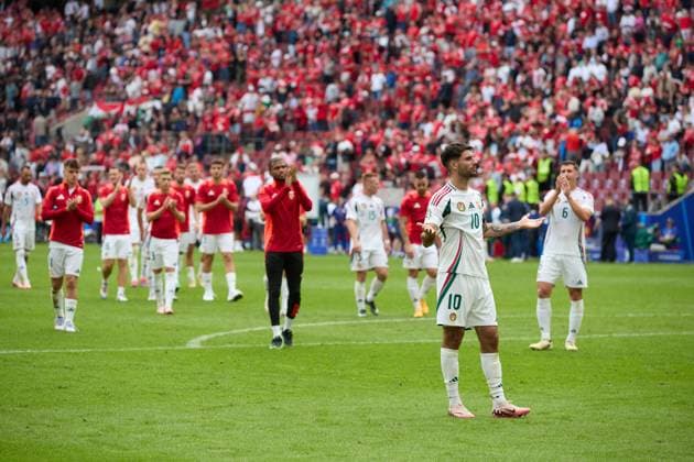 (240615) -- COLOGNE, June 15, 2024 -- Dominik Szoboszlai (front) of Hungary reacts after the UEFA EURO, EM, Europameisterschaft,Fussball 2024 Group A match between Hungary and Switzerland in Cologne, Germany, June 15, 2024. ) (SP)GERMANY-COLOGNE-FOOTBALL-EURO 2024-SWITZERLAND VS HUNGARY MengxDingbo 