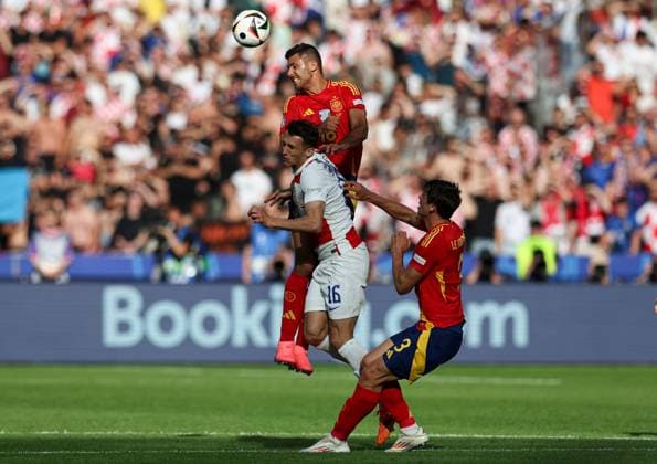 Rodri of Spain battles with Ante Budimir of Croatia in the air Spain v Croatia, UEFA European Championship, EM, Europameisterschaft 2024, Group B, Football, Olympiastadion, Berlin, Germany, 15 Jun 2024 EDITORIAL USE ONLY No use with unauthorised audio, video, data, fixture lists, club league logos or live services. Online in-match use limited to 120 images, no video emulation. No use in betting, games or single club league player publications. Copyright: xMattxWest Shutterstockx 14539284an