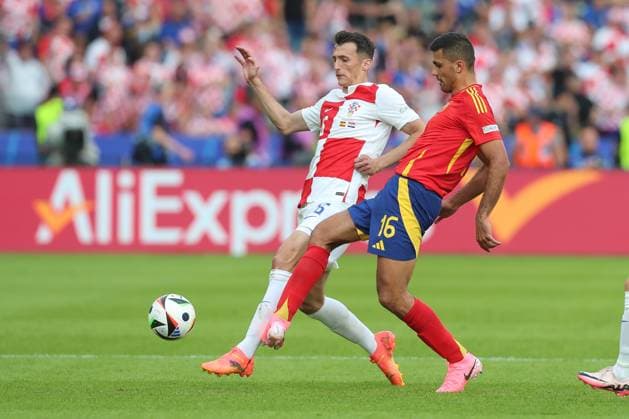 15.06.2024, xtgx, Fussball EM 2024, Spanien - Kroatien emspor, v.l. Josip Sutalo (Krotaien, 6), Rodri (Spanien, 16) zweo (DFL DFB REGULATIONS PROHIBIT ANY USE OF PHOTOGRAPHS as IMAGE SEQUENCES and or QUASI-VIDEO) Berlin