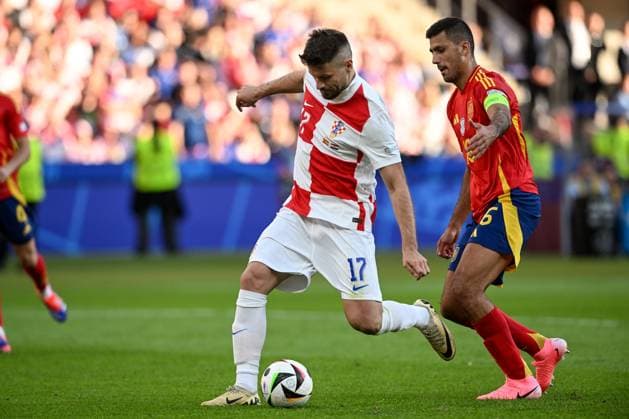 Spain v Croatia: Group B - UEFA EURO, EM, Europameisterschaft,Fussball 2024 BERLIN, GERMANY - JUNE 15: Bruno Petkovic of Croatia is fouled by Rodri of Spain during the UEFA EURO 2024 group stage match between Spain and Croatia at Olympiastadion on June 15, 2024 in Berlin, Germany. MarkoxLukunic PIXSELL