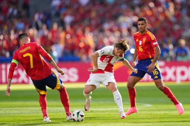 Spain v Croatia: Group B - UEFA EURO, EM, Europameisterschaft,Fussball 2024 Luka Modric central midfield of Croatia and Real Madrid and Alvaro Morata centre-forward of Spain and Atletico de Madrid compete for the ball during the UEFA EURO 2024 group stage match between Spain and Croatia at Olympiastadion on June 15, 2024 in Berlin, Germany. Berlin Germany  Copyright: xJosexBretonx originalFilename:breton-spainvcr240615_np75E.jpg