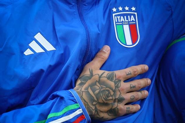 Italy v Albania 15 June 2024, Dortmund - UEFA EUROs - Group B - Italy v Albania - The tattooed hand of Gianluca Scamacca of Italy rests against the badge on his anthem jacket - Photo: Charlotte Wilson Offside. Dortmund Germany Copyright: xCharlottexWilsonx xOffsidexOffside