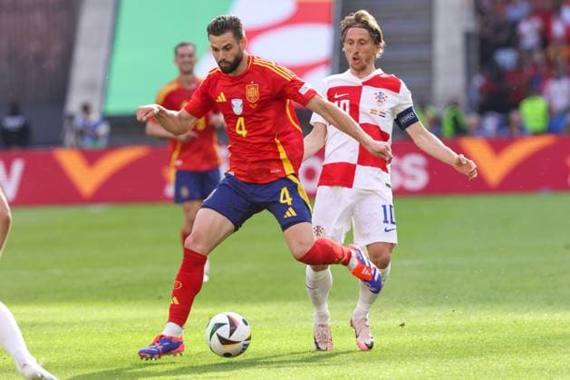 2024-06-15 Spain v Croatia - Group B - UEFA EURO, EM, Europameisterschaft,Fussball 2024 BERLIN, GERMANY - JUNE 15: Nacho of Spain battles for the ball with Luka Modric of Croatia during the Group B - UEFA EURO 2024 match between Spain and Croatia at Olympiastadion on June 15, 2024 in Berlin, Germany. (Photo by Peter Lous BSR Agency) Berlin Germany Content not available for redistribution in The Netherlands directly or indirectly through any third parties. Copyright: xBSRxAgencyx