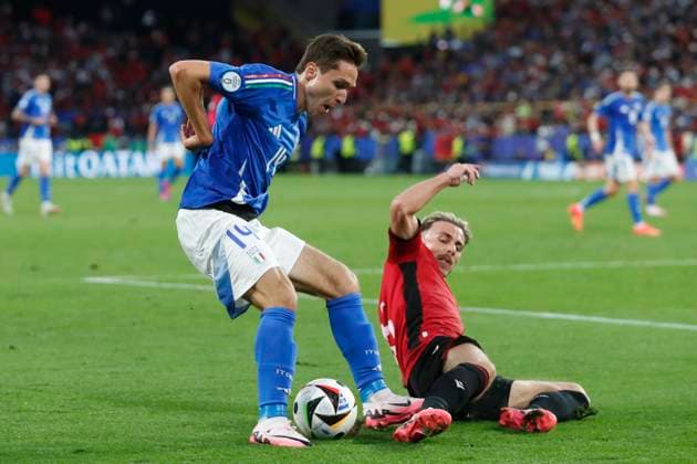 Italy v Albania UEFA EURO, EM, Europameisterschaft,Fussball 2024 Group B Federico Chiesa of Italy and Taulant Seferi of Albania in action during the UEFA Euro 2024 Group B match between Italy and Albania at Signal Iduna Park, Dortmund Copyright: xPaulxChestertonx FIL-20282-0156 UK Newspapers OUT