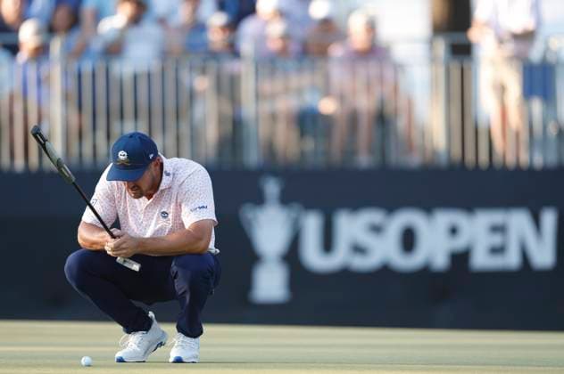 Bryson DeChambeau lines up a putt on the fifteenth green during the third round of the 124th U.S. Open golf championship at Pinehurst Resort & Country Club in Pinehurst, N.C. on Saturday, June 15, 2024.  NCP20240615366 JOHNxANGELILLO