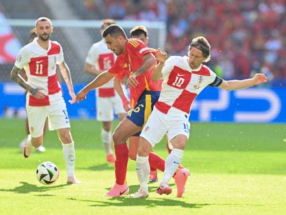 (240616) -- BERLIN, June 16, 2024 -- Luka Modric (1st R) of Croatia vies for the ball during the UEFA EURO, EM, Europameisterschaft,Fussball 2024 Group B match between Spain and Croatia in Berlin, Germany on June 15, 2024. ) (SP)GERMANY-BERLIN-FOOTBALL-EURO 2024-SPAIN VS CROATIA RenxPengfei 