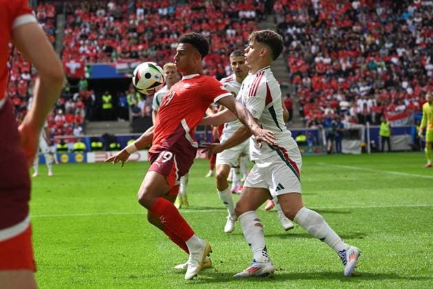 Dan Ndoye (Switzerland)Milos Kerkez (Hungary) during the UEFA EURO, EM, Europameisterschaft,Fussball Germany 2024 match between Hungary 1-3 Switzerland at Cologne Stadium on June 15, 2024 in Cologne, Germany. Noxthirdxpartyxsales  (256543095)