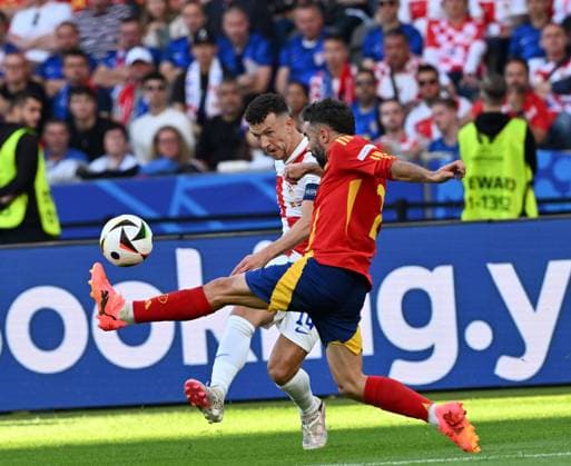 (240616) -- BERLIN, June 16, 2024 -- Daniel Carvajal Ramos (R) of Spain vies with Ivan Perisic of Croatia during the UEFA EURO, EM, Europameisterschaft,Fussball 2024 Group B match between Spain and Croatia in Berlin, Germany on June 15, 2024. ) (SP)GERMANY-BERLIN-FOOTBALL-EURO 2024-SPAIN VS CROATIA RenxPengfei 