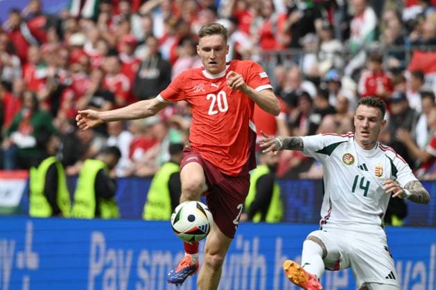 Michel Aebischer (Schweiz), Bendeguz Bolla (Ungarn), v.li. 15.06.2024, Fussball Europameisterschaft 2024, Vorrunde, 1. Spieltag Ungarn - Schweiz 1:3 Koeln Rhein Energie Stadion Nordrhein Westfalen Deutschland