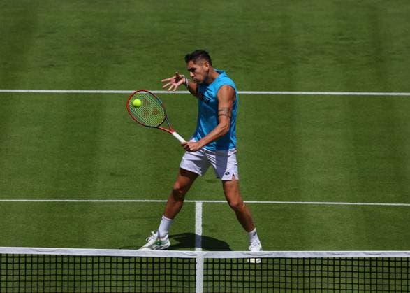 16th June 2024; Cinch Championships, Queens Club, West Kensington, London, England: Cinch Championships Queens Club, Qualifying Day 2; Alejandro Tabilo (CHI) with a backhand shot to Grigor Dimitrov (BUL) during his practise session on Centre Court  ActionPlus12655087 JohnxPatrickxFletcher