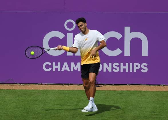 16th June 2024; Cinch Championships, Queens Club, West Kensington, London, England: Cinch Championships Queens Club, Qualifying Day 2; Francisco Cerundolo (ARG) with a forehand shot to Carlos Alcaraz (ESP) during his practice session on Centre Court  ActionPlus12655110 JohnxPatrickxFletcher