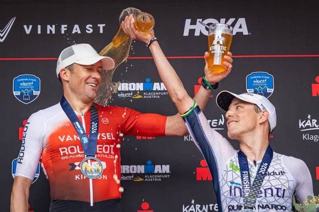 Sport Themen der Woche KW24 Sport Bilder des Tages TRIATHLON - Ironman Austria 2024 KLAGENFURT,AUSTRIA,16.JUN.24 - TRIATHLON - Ironman Kaernten-Klagenfurt. Image shows the rejoicing of Denis Chevrot (FRA) and Jon Saeveraas Breivold (NOR). Keywords: award-ceremony.  GEPAxpictures xMatthiasxTrinkl