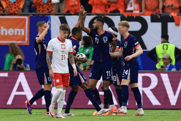 Cody Gakpo of The Netherlands celebrates scoring the goal for their side with their teammates to make it 1-1 Poland v Netherlands, UEFA European Championship, EM, Europameisterschaft 2024, Group D, Football, Volksparkstadion, Hamburg, Germany, 16 Jun 2024 EDITORIAL USE ONLY No use with unauthorised audio, video, data, fixture lists, club league logos or live services. Online in-match use limited to 120 images, no video emulation. No use in betting, games or single club league player publications. Copyright: xMattxWest Shutterstockx 14539367ca