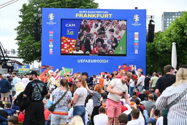 EURO 2024, Fanzone in Frankfurt Belgium v Slovakia Group E - UEFA EURO, EM, Europameisterschaft,Fussball 2024 16 06 2024 FRANKFURT AM MAIN, GERMANY - JUNE 16 : Supporters and fans enjoy the Fanzone ahead of the UEFA EURO 2024 European Football Championship tournament group E stage match between Belgium and Slovakia at Frankfurt Arena on June 16, 2024 in Frankfurt am Main, Germany, 16 06 2024 Frankfurt am Main Germany  Copyright: xVincentxKalutx