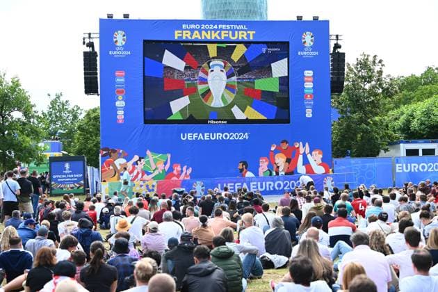 EURO 2024, Fanzone in Frankfurt Belgium v Slovakia Group E - UEFA EURO, EM, Europameisterschaft,Fussball 2024 16 06 2024 FRANKFURT AM MAIN, GERMANY - JUNE 16 : Supporters and fans enjoy the Fanzone ahead of the UEFA EURO 2024 European Football Championship tournament group E stage match between Belgium and Slovakia at Frankfurt Arena on June 16, 2024 in Frankfurt am Main, Germany, 16 06 2024 Frankfurt am Main Germany  Copyright: xVincentxKalutx