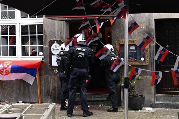 GELSENKIRCHEN, GERMANY - JUNE 16: Police secure the area outside a restaurant where a Serbia fan was attacked by a masked fan in Gelsenkirchen city centre of before the UEFA EURO, EM, Europameisterschaft,Fussball 2024 group stage match between Serbia and England at Arena AufSchalke on June 16, 2024 in Gelsenkirchen, Germany.Photo by Sebastian Frej Serbia v England: Group C - UEFA EURO 2024 Copyright: xSebastianxFrejx