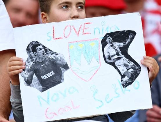 A young Slovenian fan holds a sign for Benjamin Sesko of Slovenia Slovenia v Denmark, UEFA European Championship, EM, Europameisterschaft 2024, Group C, Football, Stuttgart Arena, Stuttgart, Germany, 16 Jun 2024 EDITORIAL USE ONLY No use with unauthorised audio, video, data, fixture lists, club league logos or live services. Online in-match use limited to 120 images, no video emulation. No use in betting, games or single club league player publications. Copyright: xMichaelxZemanek Shutterstockx 14539399ah
