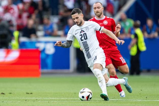 240616 Petar Stojanovic of Slovenia and Christian Eriksen of Denmark during the UEFA EURO, EM, Europameisterschaft,Fussball 2024 Football Championship match between Slovenia and Denmark on June 16, 2024 in Stuttgart. Photo: Mathias Bergeld BILDBYRAN kod MB MB0936 fotboll football soccer fotball fotbolls-em europamästerskap em uefa euro uefa european football championship euro 2024 slovenien slovenia danmark denmark bbeng Copyright: MATHIASxBERGELD BB240616MB052