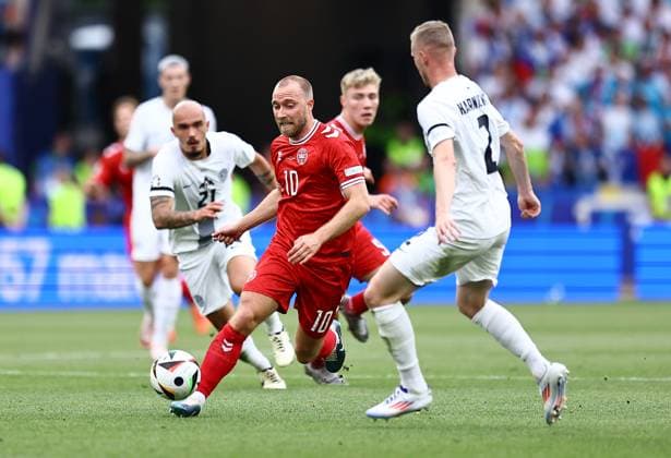Christian Eriksen of Denmark takes on Zan Karnicnik of Slovenia Slovenia v Denmark, UEFA European Championship, EM, Europameisterschaft 2024, Group C, Football, Stuttgart Arena, Stuttgart, Germany, 16 Jun 2024 EDITORIAL USE ONLY No use with unauthorised audio, video, data, fixture lists, club league logos or live services. Online in-match use limited to 120 images, no video emulation. No use in betting, games or single club league player publications. Copyright: xMichaelxZemanek Shutterstockx 14539399cg