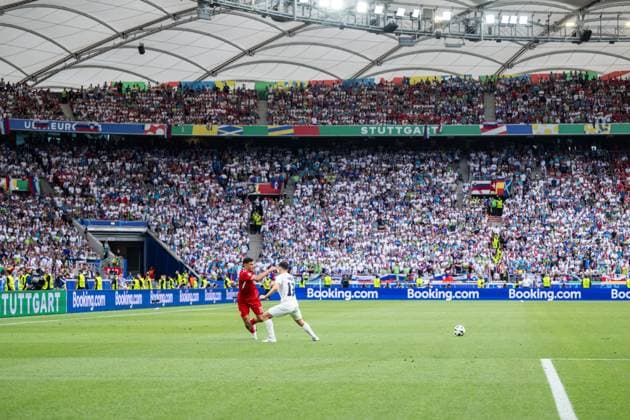 240616 Alexander Bah of Denmark and Erik Janza of Slovenia during the UEFA EURO, EM, Europameisterschaft,Fussball 2024 Football Championship match between Slovenia and Denmark on June 16, 2024 in Stuttgart. Photo: Mathias Bergeld BILDBYRAN kod MB MB0936 fotboll football soccer fotball fotbolls-em europamästerskap em uefa euro uefa european football championship euro 2024 slovenien slovenia danmark denmark bbeng Copyright: MATHIASxBERGELD BB240616MB063