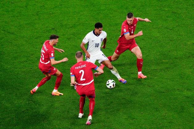 Jude Bellingham of England surrounded by Serbia players Serbia v England, UEFA European Championship, EM, Europameisterschaft 2024, Group C, Football, Arena Aufschalke, Gelsenkirchen, Germany, 16 Jun 2024 EDITORIAL USE ONLY No use with unauthorised audio, video, data, fixture lists, club league logos or live services. Online in-match use limited to 120 images, no video emulation. No use in betting, games or single club league player publications. Copyright: xDavexShopland Shutterstockx 14539403bd