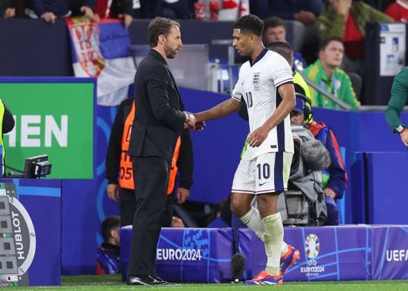 Gelsenkirchen, Germany, 16th June 2024. Gareth Southgate manager of England greets Jude Bellingham of England after substituting him during the UEFA European Championships match at Arena Aufschalke, Gelsenkirchen. Picture credit should read: David Klein Sportimage EDITORIAL USE ONLY. No use with unauthorised audio, video, data, fixture lists, club league logos or live services. Online in-match use limited to 120 images, no video emulation. No use in betting, games or single club league player publications. SPI-3196-0085