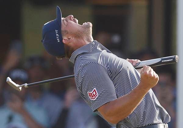 Bryson DeChambeau celebrates after winning the 124th U.S. Open golf championship at Pinehurst Resort & Country Club in Pinehurst, N.C. on Sunday, June 16, 2024. DeChambeau won with a six-under-par score of 274.  NCP20240616354 JOHNxANGELILLO
