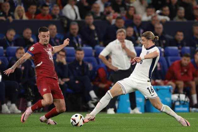 Gelsenkirchen, Germany, 16th June 2024. Sergej Milinkovic-Savic of Serbia challenges Conor Gallagher of England during the UEFA European Championships match at Arena Aufschalke, Gelsenkirchen. Picture credit should read: Jonathan Moscrop Sportimage EDITORIAL USE ONLY. No use with unauthorised audio, video, data, fixture lists, club league logos or live services. Online in-match use limited to 120 images, no video emulation. No use in betting, games or single club league player publications. SPI-3183-0036