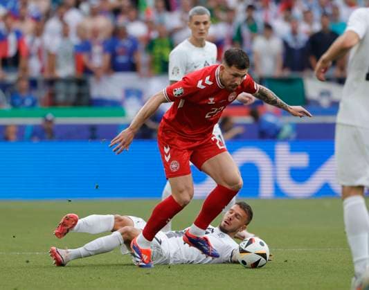 (240617) -- STUTTGART, June 17, 2024 -- Pierre-Emile Hojbjerg (top) of Denmark competes during the UEFA EURO, EM, Europameisterschaft,Fussball 2024 Group C match between Denmark and Slovenia in Stuttgart, Germany on June 16, 2024. (Photo by Xinhua) (SP)GERMANY-STUTTGART-FOOTBALL-EURO 2024-DENMARK VS SLOVENIA PhilippexRuiz 