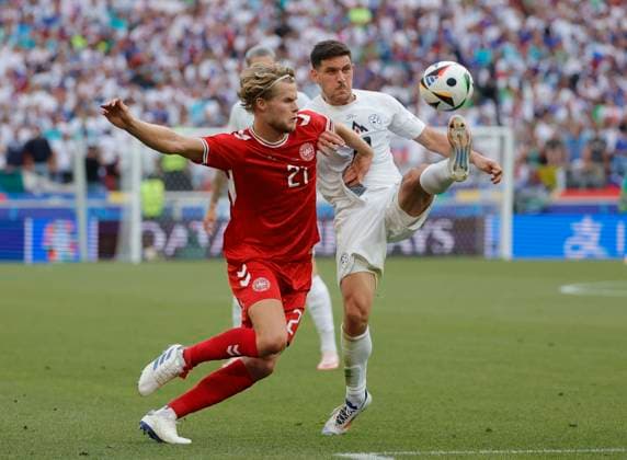 (240617) -- STUTTGART, June 17, 2024 -- Morten Hjulmand (L) of Denmark vies against Erik Janza of Slovenia during the UEFA EURO, EM, Europameisterschaft,Fussball 2024 Group C match between Denmark and Slovenia in Stuttgart, Germany on June 16, 2024. (Photo by Xinhua) (SP)GERMANY-STUTTGART-FOOTBALL-EURO 2024-DENMARK VS SLOVENIA PhilippexRuiz 