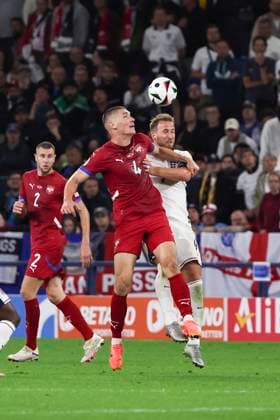 (240617) -- GELSENKIRCHEN, June 17, 2024 -- Nikola Milenkovic (C) of Serbia and Harry Kane of England head for the ball during the UEFA EURO, EM, Europameisterschaft,Fussball 2024 Group C match between England and Serbia in Gelsenkirchen, Germany on June 16, 2024. ) (SP)GERMANY-GELSENKIRCHEN-FOOTBALL-EURO 2024-ENGLAND VS SERBIA ZhangxFan 