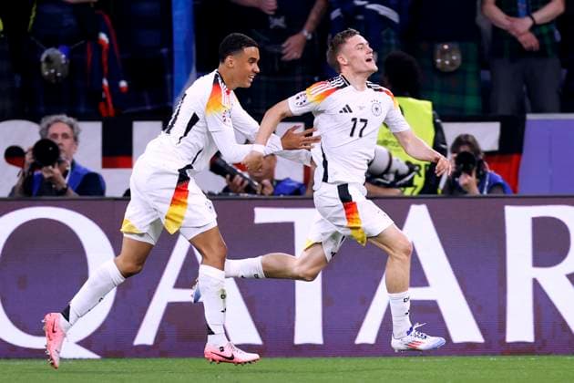 WIRTZ Florian Team Deutschland jubelt nach seinem Tor zum 1 : 0 mit MUSIALA Jamal UEFA Fussball Eueropameisterschaften 2024 in Deutschland Eroeffnungsspiel Deutschland - Schottland am 14.06. 2024 in Muenchen DFL REGULATIONS PROHIBIT ANY USE OF PHOTOGRAPHS as IMAGE SEQUENCES and or QUASI-VIDEO Copyright: xLacixPerenyix