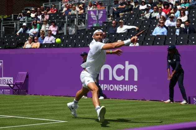 17th June 2024; Cinch Championships, Queens Club, West Kensington, London, England: Cinch Championships Queens Club, Day 1; Grigor Dimitrov (BUL) with a backhand shot to Adrian Mannarino (FRA) mens singles  ActionPlus12655630 JohnxPatrickxFletcher