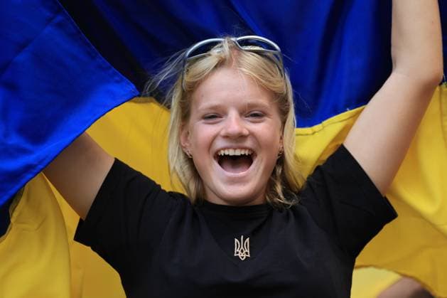 17th June 2024; Munich Football Arena, Munich, Germany; Euro 2024 Group E Football, Romania versus Ukraine; A young fan from Ukraine with team flag  ActionPlus12655675 PierrexTeyssot