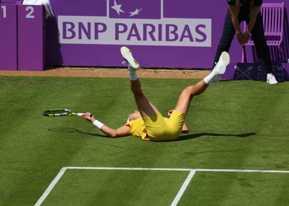 17th June 2024; Cinch Championships, Queens Club, West Kensington, London, England: Cinch Championships Queens Club, Day 1; Holger Rune (DEN) slips &amp; falls onto the court in his match against Jordan Thompson (AUS) , mens singles match  ActionPlus12655739 JohnxPatrickxFletcher