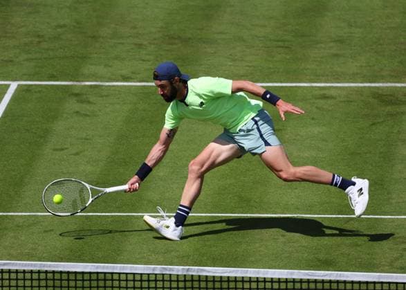 17th June 2024; Cinch Championships, Queens Club, West Kensington, London, England: Cinch Championships Queens Club, Day 1; Jordan Thompson (AUS) with a forehand shot to Holger Rune (DEN) , mens singles match  ActionPlus12655741 JohnxPatrickxFletcher